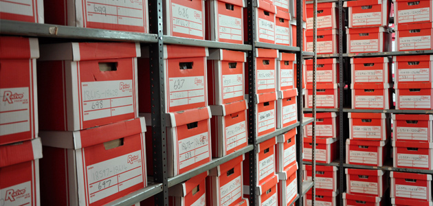 Hobden's - A corridor of many lime green shutter doors